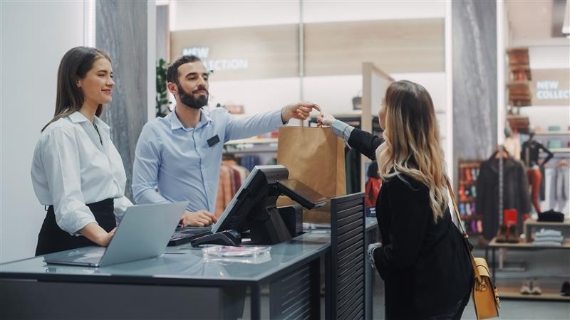 customer at cashier counter checkout